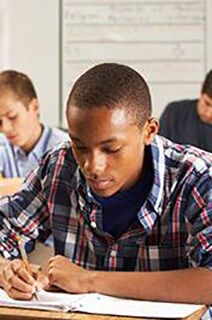 Group of students studying in a classroom