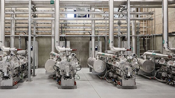Heat pumps installed in a sequence in an industrial building