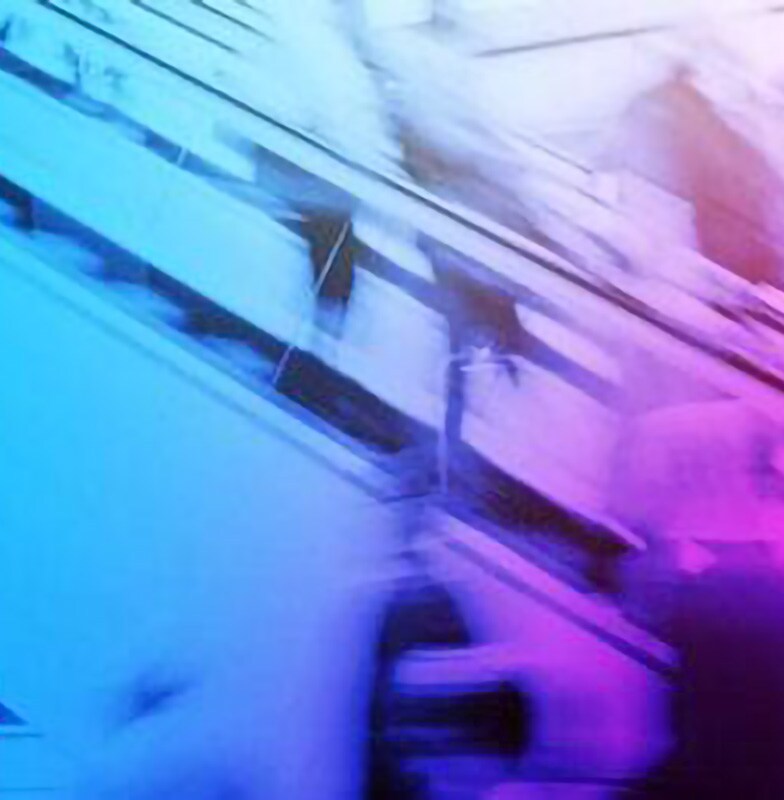 Motion blur image of people walking on and around an escalator with a blue-purple gradient