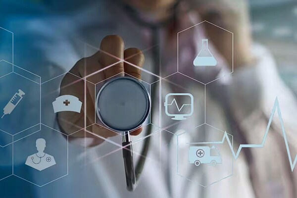 A doctor pointing his stethoscope at a smart screen displaying health icons