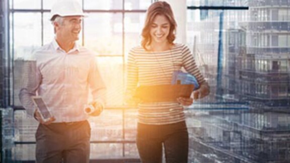 architects-looking-at-tab-discussing-work