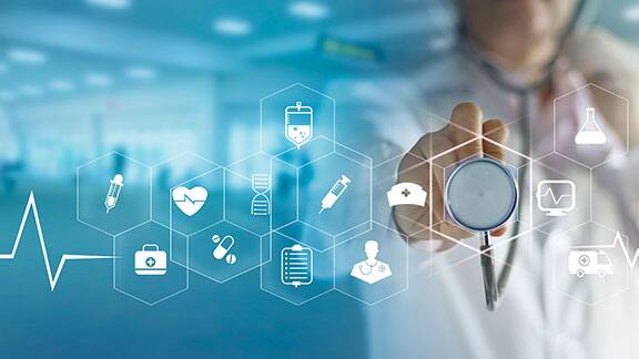 A doctor pointing a stethoscope at a smartscreen displaying health icons