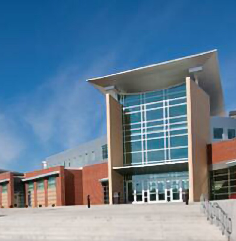 Staircase leading up to a large school building