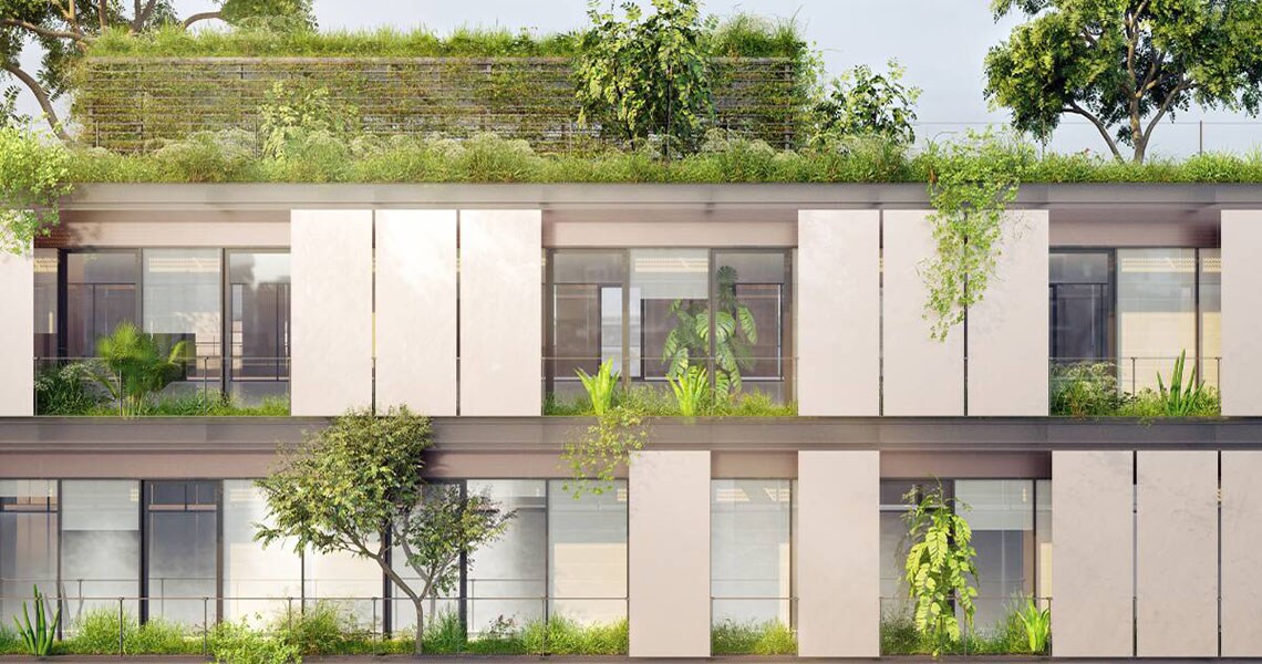 Facade of a modern residential building with green plants potted across open balconies