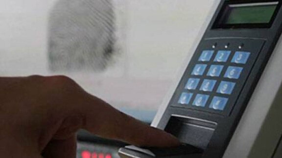 A person accessing the biometric access control