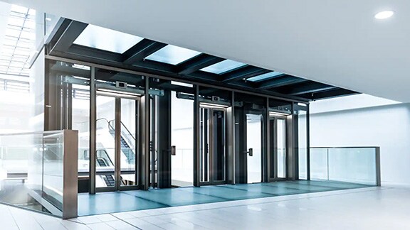 A view of corridor and escalator of a empty commercial space 