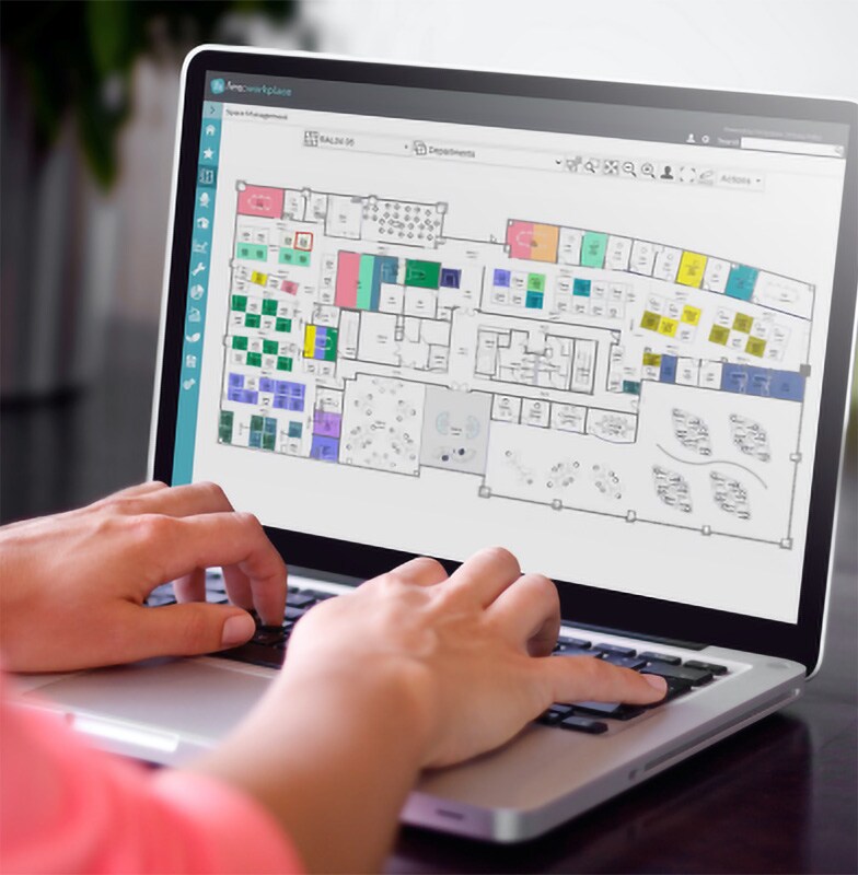 Person using the FM:Systems software on a laptop