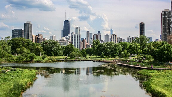 An urban skyline on the banks of a water body